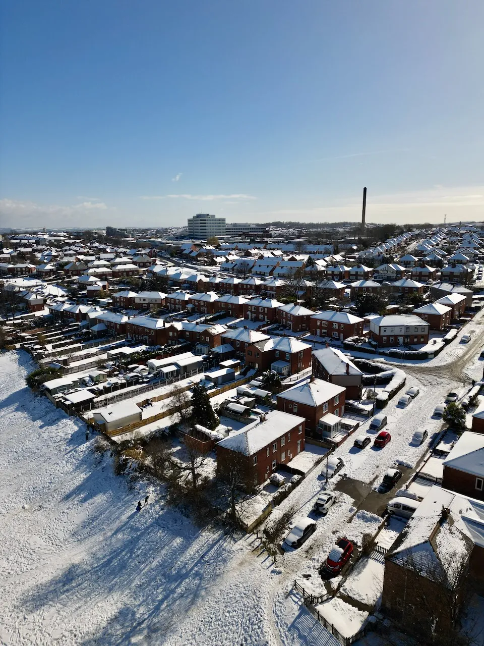 Aerial shot of Barnsley Hospital covered in snow.