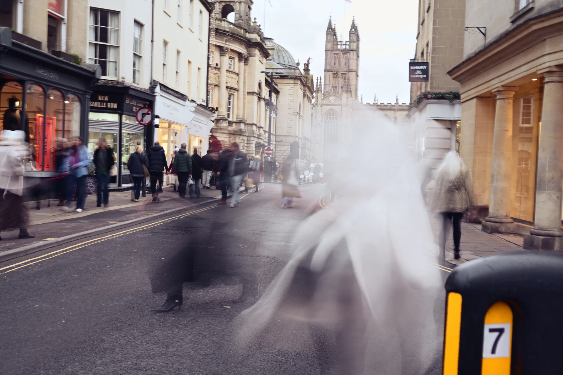 A street in Bath with blurred figures